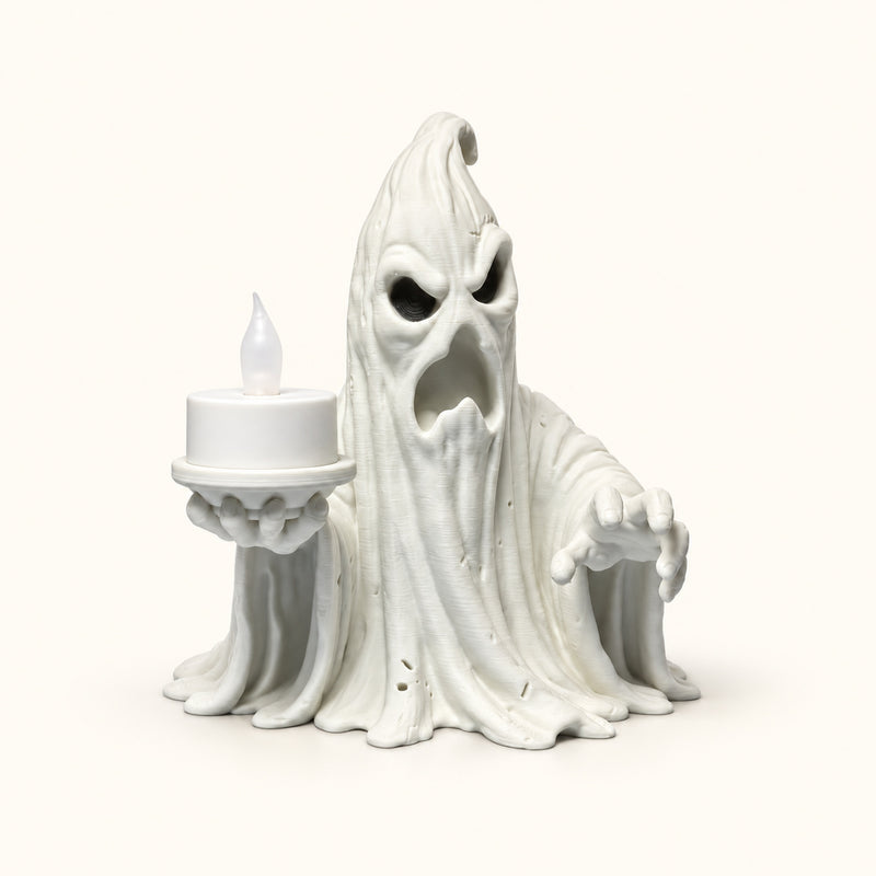 White draped ghost holding a white LED tealight on a raised platform on a soft white background.