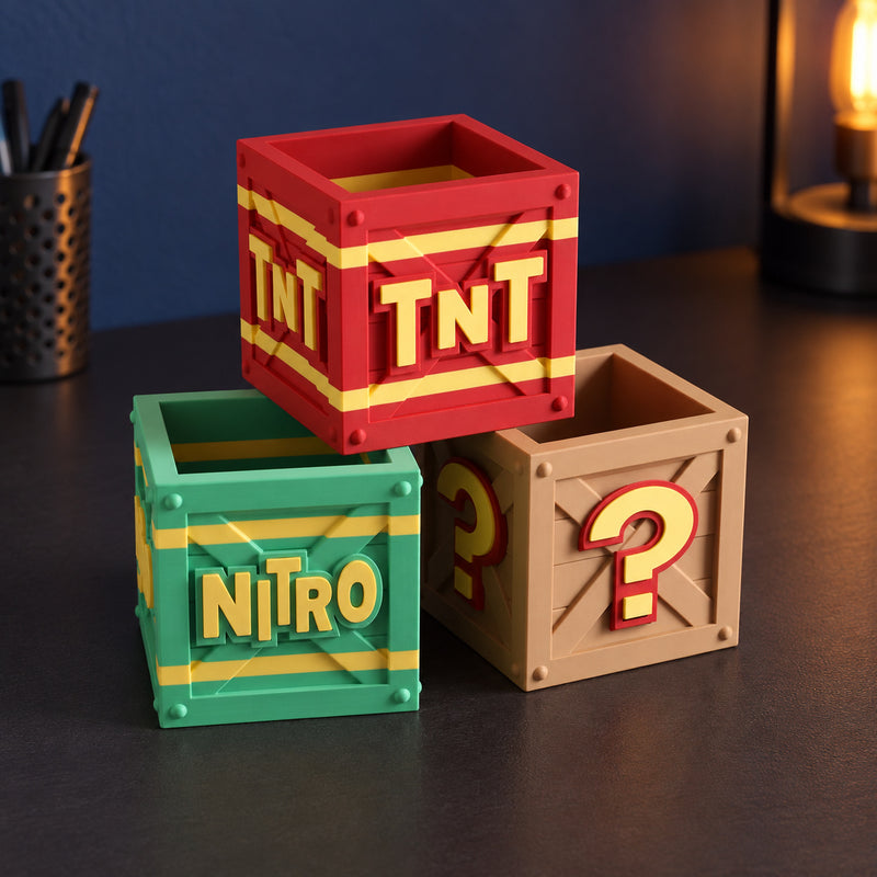Red TNT, green NITRO and brown question-mark miniature crates in a styled home setting.