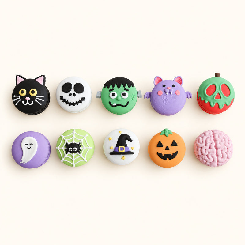 Colourful round Halloween character collectibles arranged in two rows on a soft white background.