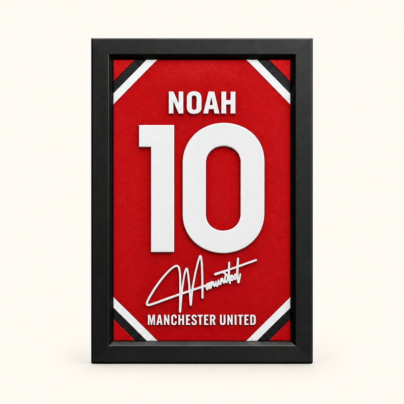 Manchester United jersey frame personalized with NOAH and the number 10 on a soft white background.