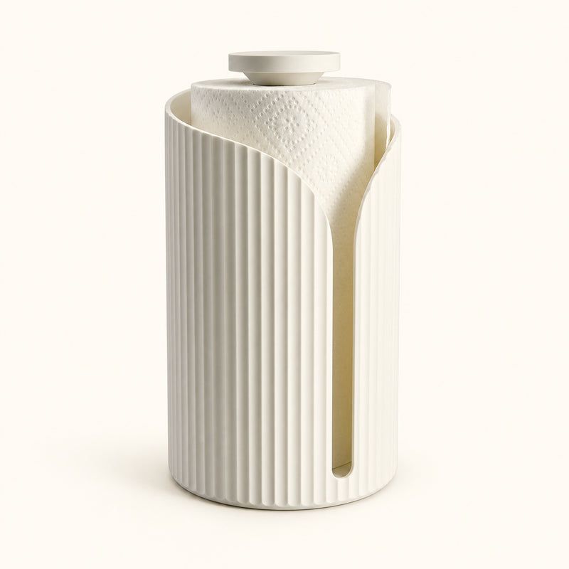Pale fluted paper towel holder with a curved opening and top cap on a soft white background.