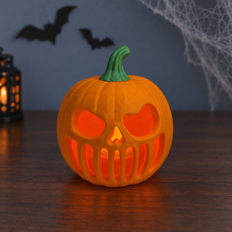 Orange grinning pumpkin lantern with a green stem and warm interior light in a styled home setting.